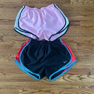 Two women’s dri-fit Nike shorts